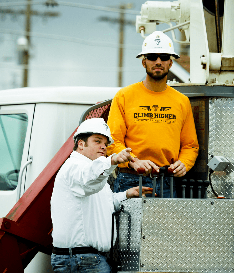 exp-img Crane Trainer and Student operating mobile crane in practical exam/test